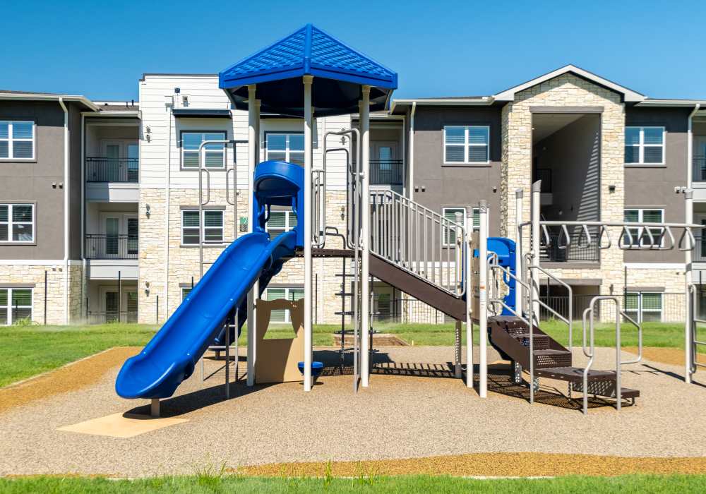 Playground in the community at Terrace at Southern Oaks in Dallas, Texas