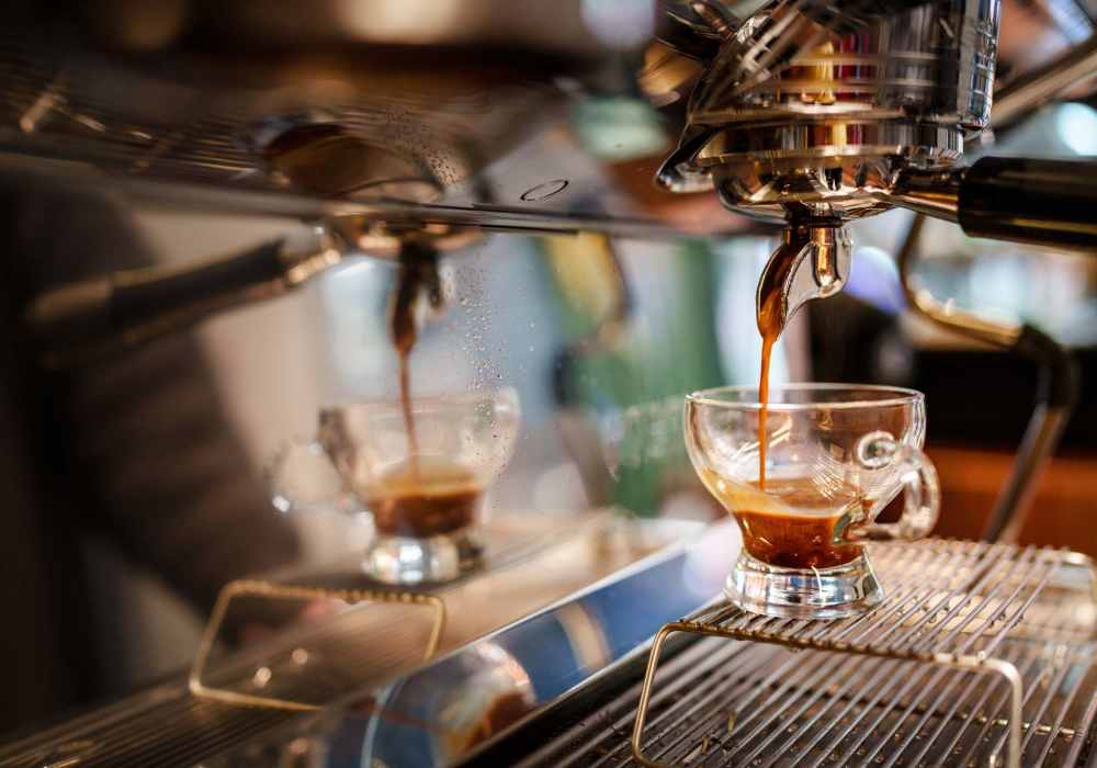 Espresso pouring into a clear glass cup at Terrace at Southern Oaks in Dallas, Texas