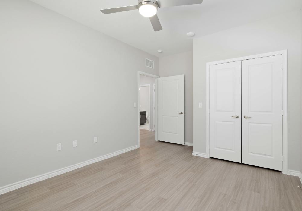 Bedroom with wood-style flooring at Sankofa Landing in Durham,North Carolina
