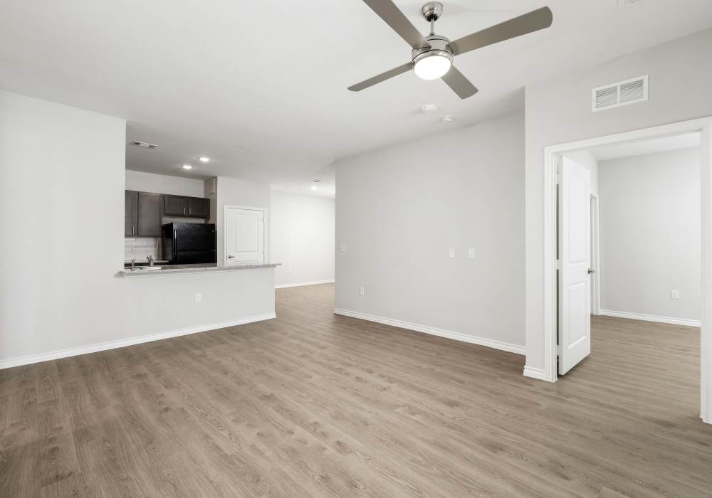 Unfurnished living room with a ceiling fan at Preserve at Gresham Lake in Raleigh,North Carolina