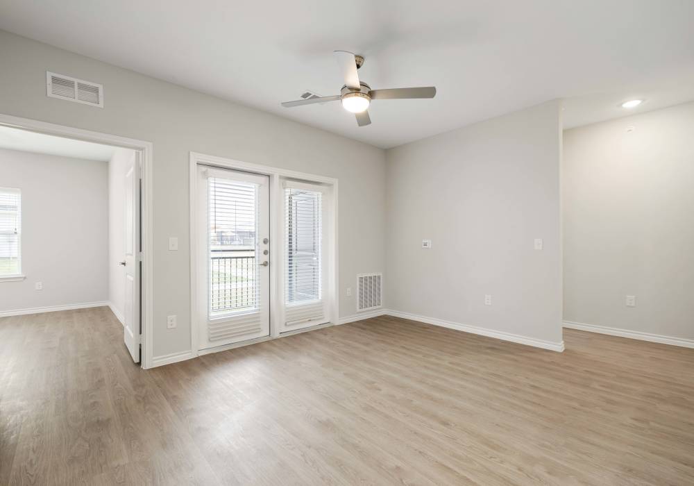 Unfurnished apartment room with wood-style flooring at Preserve at Gresham Lake in Raleigh,North Carolina