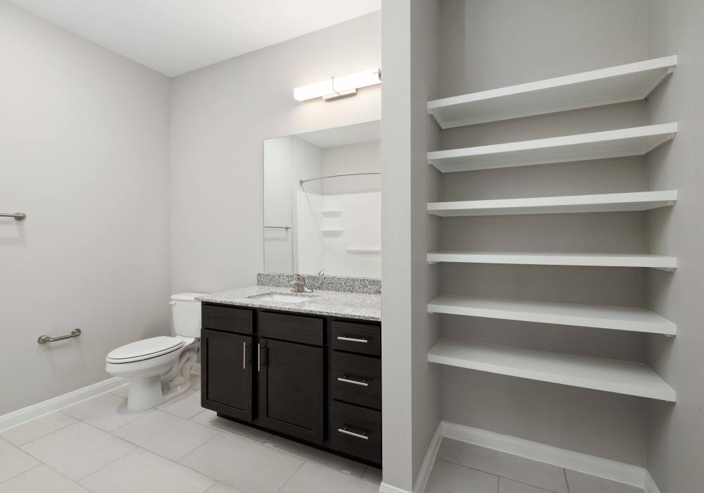 Bathroom with storage spaces at Preserve at Gresham Lake in Raleigh,North Carolina