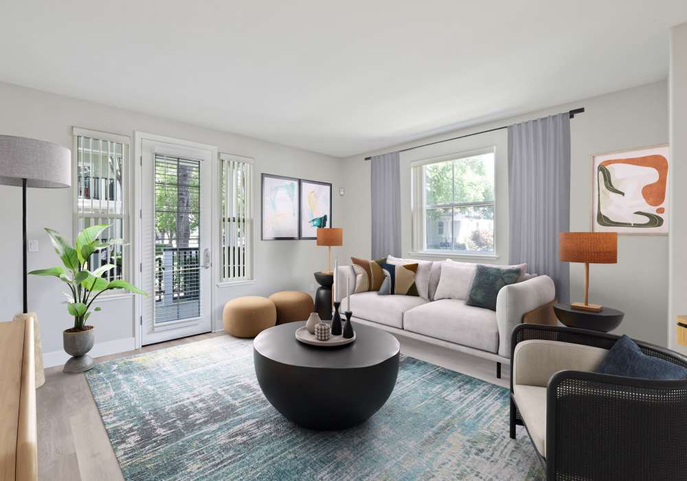 Spacious living room with large amounts of natural light at The Kensington in Pleasanton, California