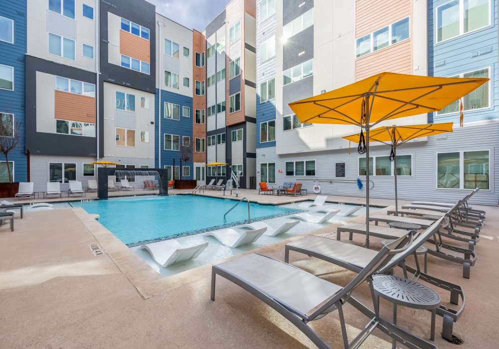 Sparkling swimming pool at The Rail Apartments in Austin, Texas