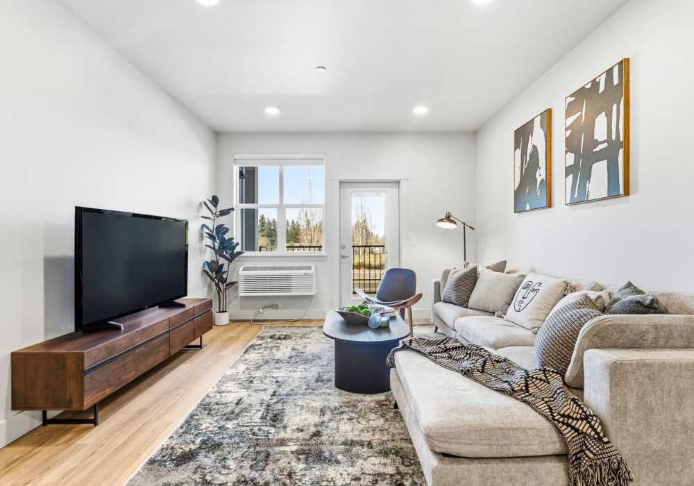 Spacious Living Room with Private Balcony at The Heights at Happy Valley in Happy Valley, Oregon