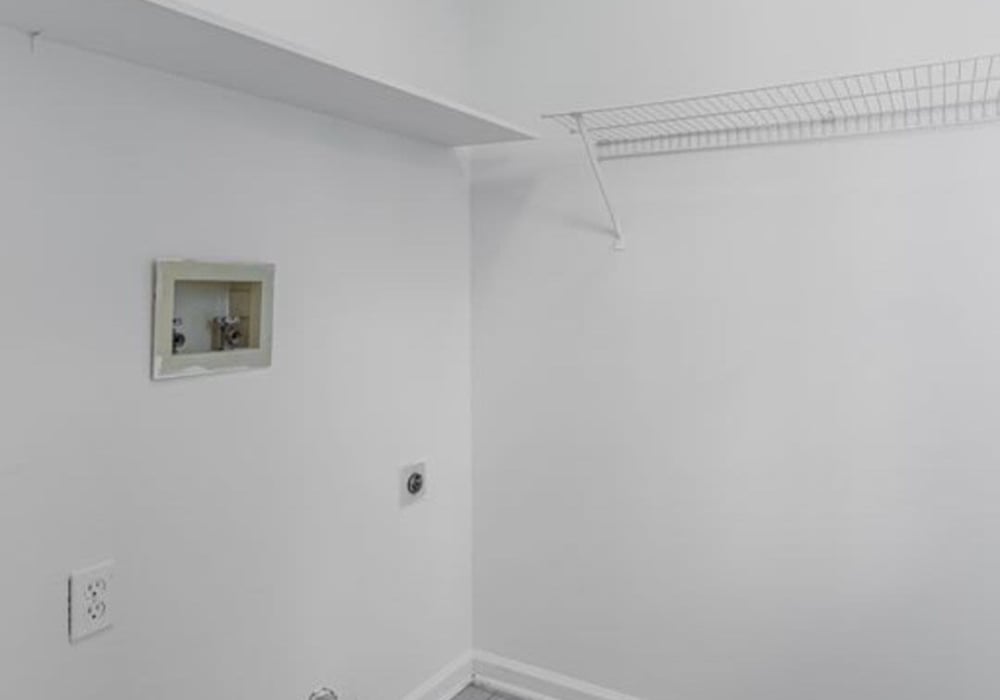 Walk-in closet at North Road Townhomes in Scottsville, New York