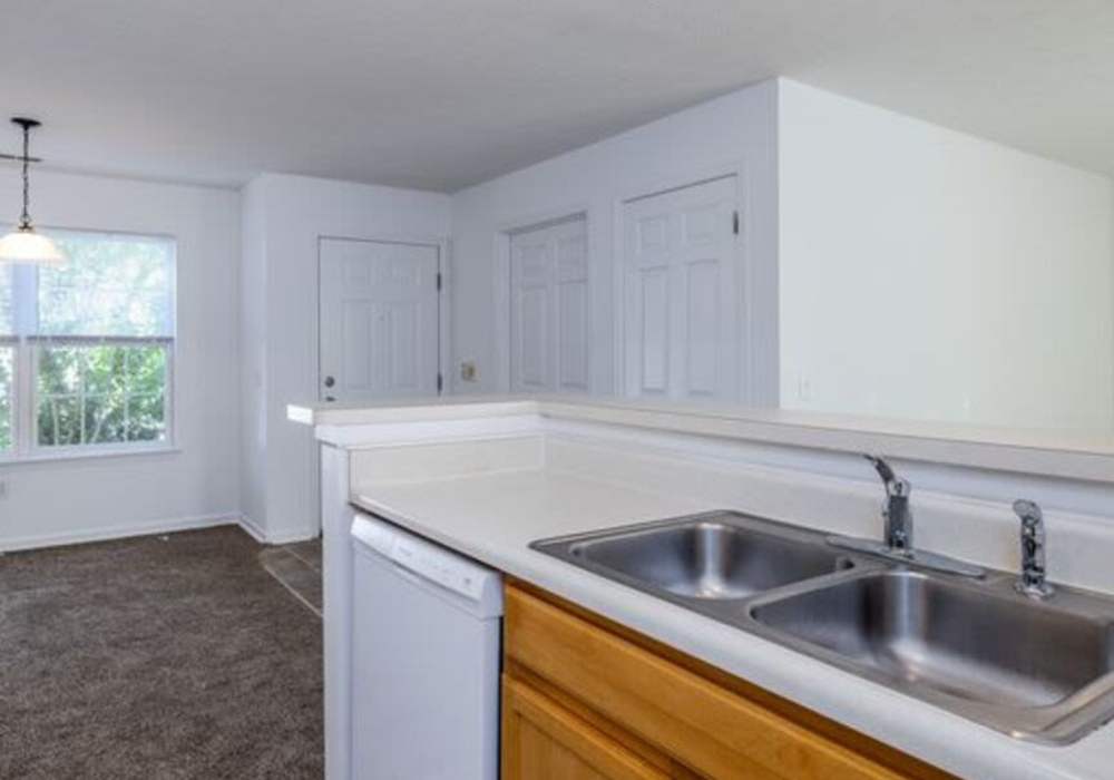 Sink of a kitchen at Heritage Park Apartments & Townhomes in Webster, New York
