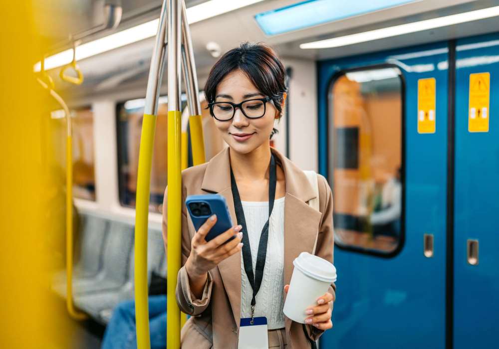 Resident see phone inside train at J Luna at Ballston in Arlington, Virginia