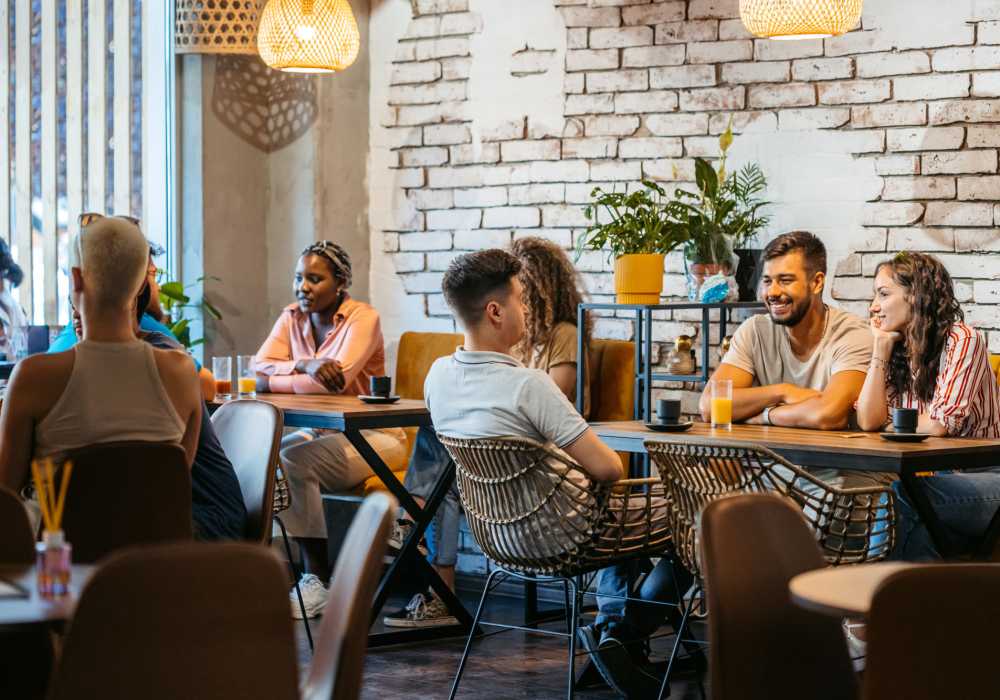 Residents in a restaurant at Heritage Park Apartments & Townhomes in Webster, New York