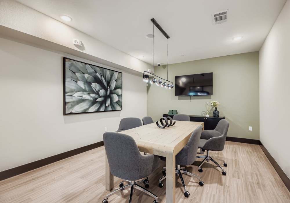 Modern conference room with professional meeting space and comfortable seating at Standard at Royal Lane in Dallas, Texas