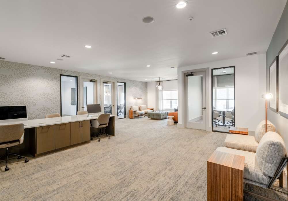 Coworking lounge and conference rooms available for residents at Fidelis Willis in Willis, Texas.