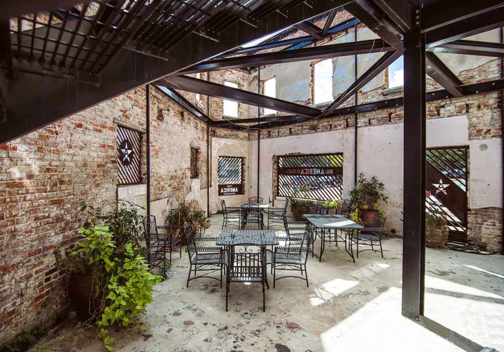 Exposed brick walls with metal framework at Hub City Lofts in Hattiesburg, Mississippi