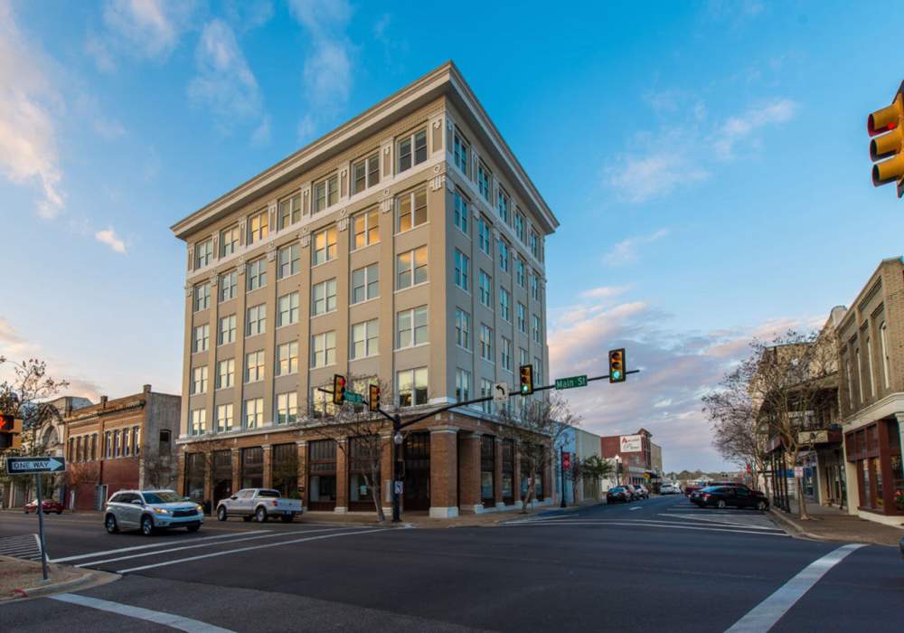 Building with multiple windows at Hub City Lofts in Hattiesburg, Mississippi