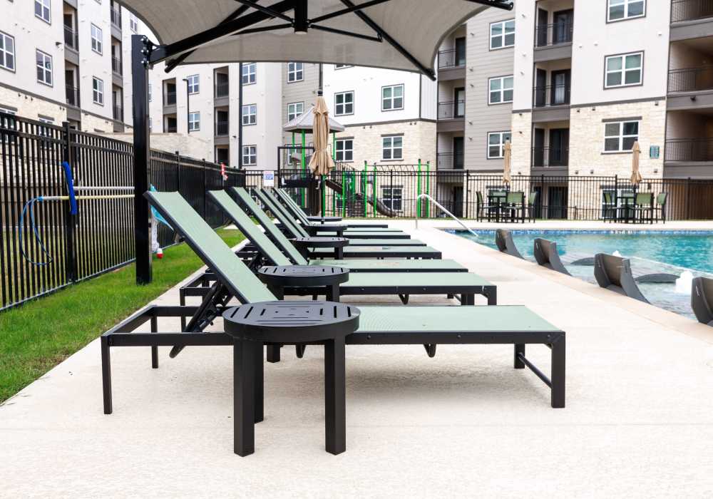Swimming pool and lounge area at Oak Creek in New Braunfels, Texas