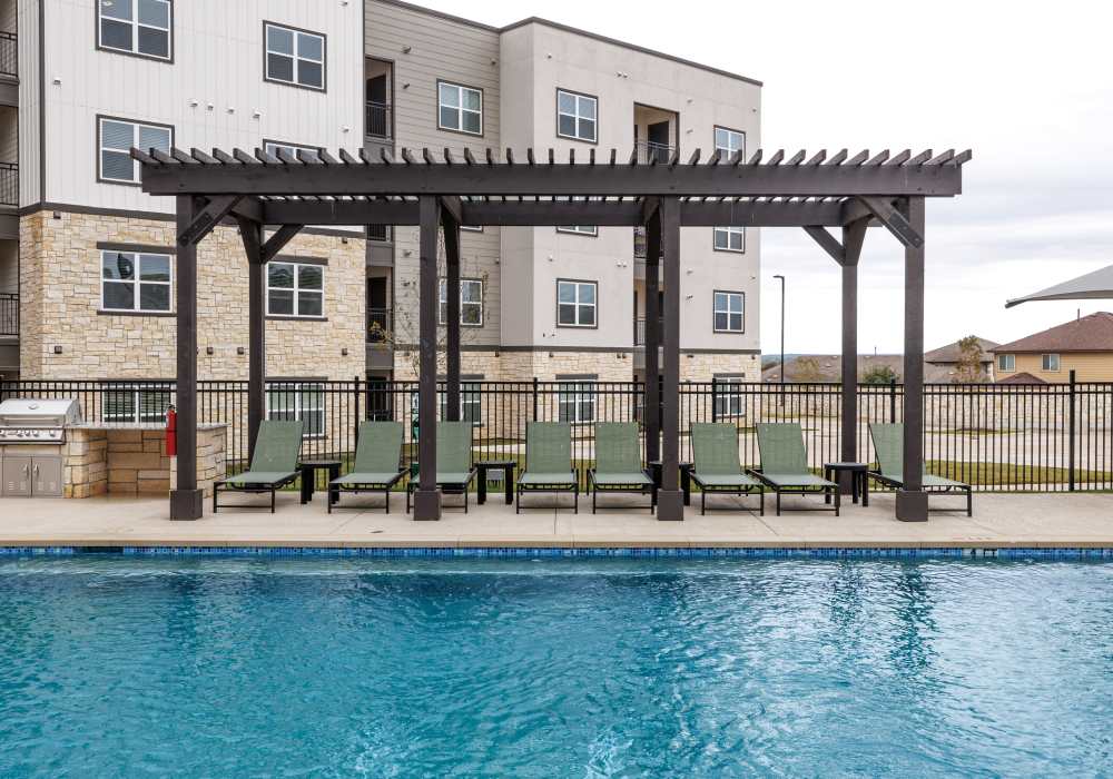 Swimming pool and pergola area at Oak Creek in New Braunfels, Texas
