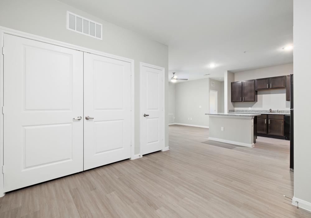 Contemporary apartment interior with light wood-style flooring  at Oak Creek in New Braunfels, Texas