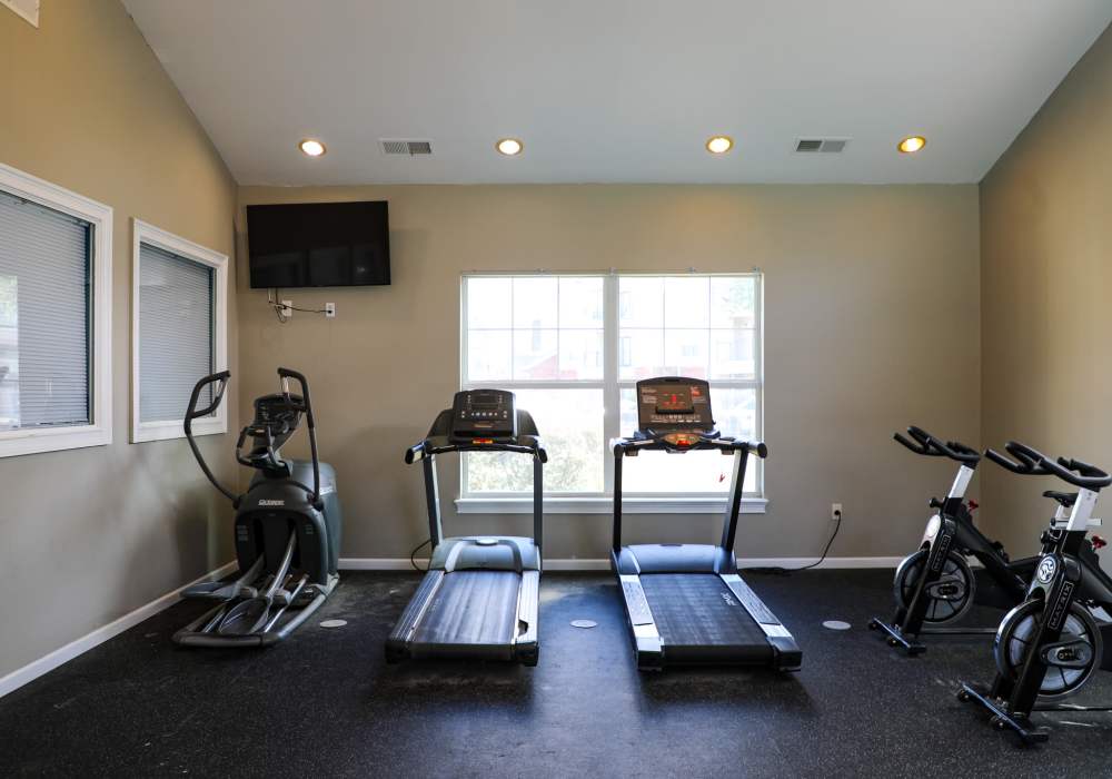 Fitness center with television at Andrews Place in Panama City, Florida