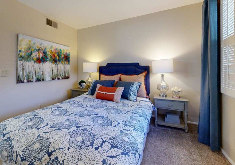 Bright bedroom at Wasatch Club Apartments in Midvale, Utah, 