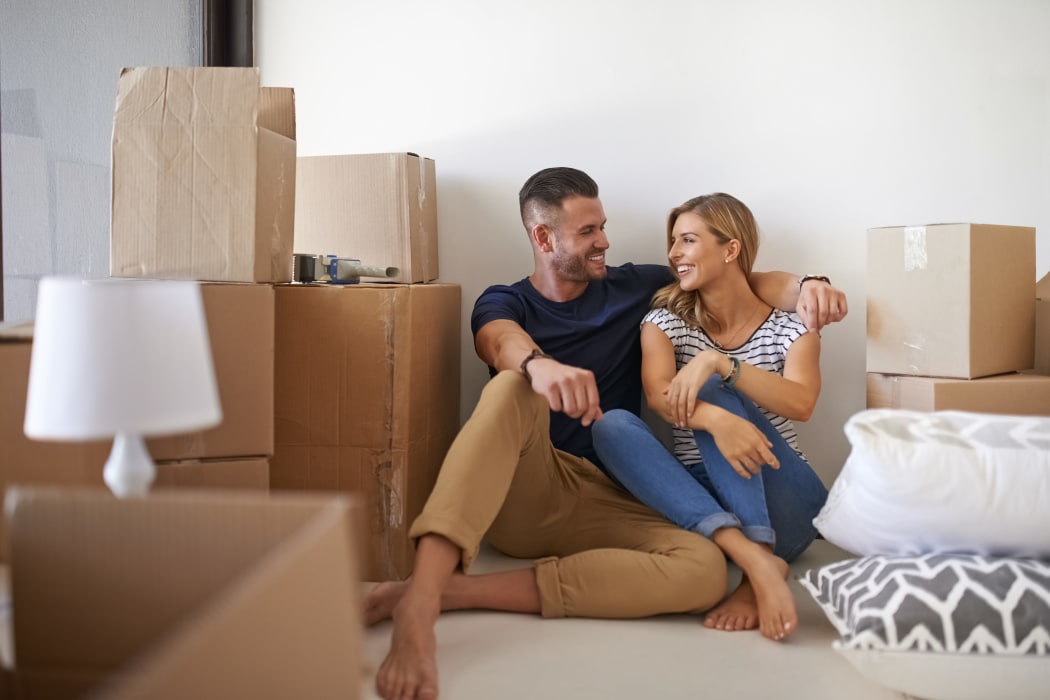 Family moving with boxes from Lockaway Storage in San Antonio, Texas