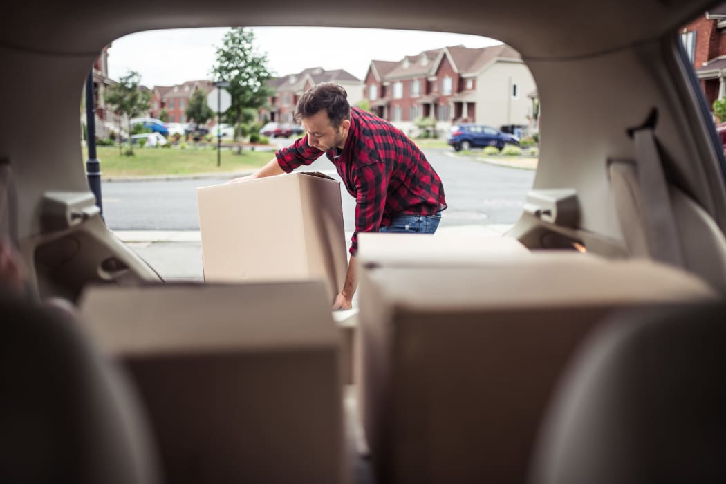 Man packing up boxes to be stored at Lockaway Storage in Schertz, Texas