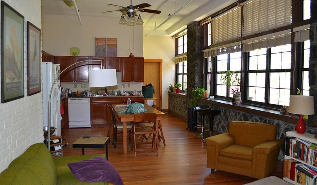 A furnished apartment living room and kitchen at Kenilworth Inn in Asheville, North Carolina