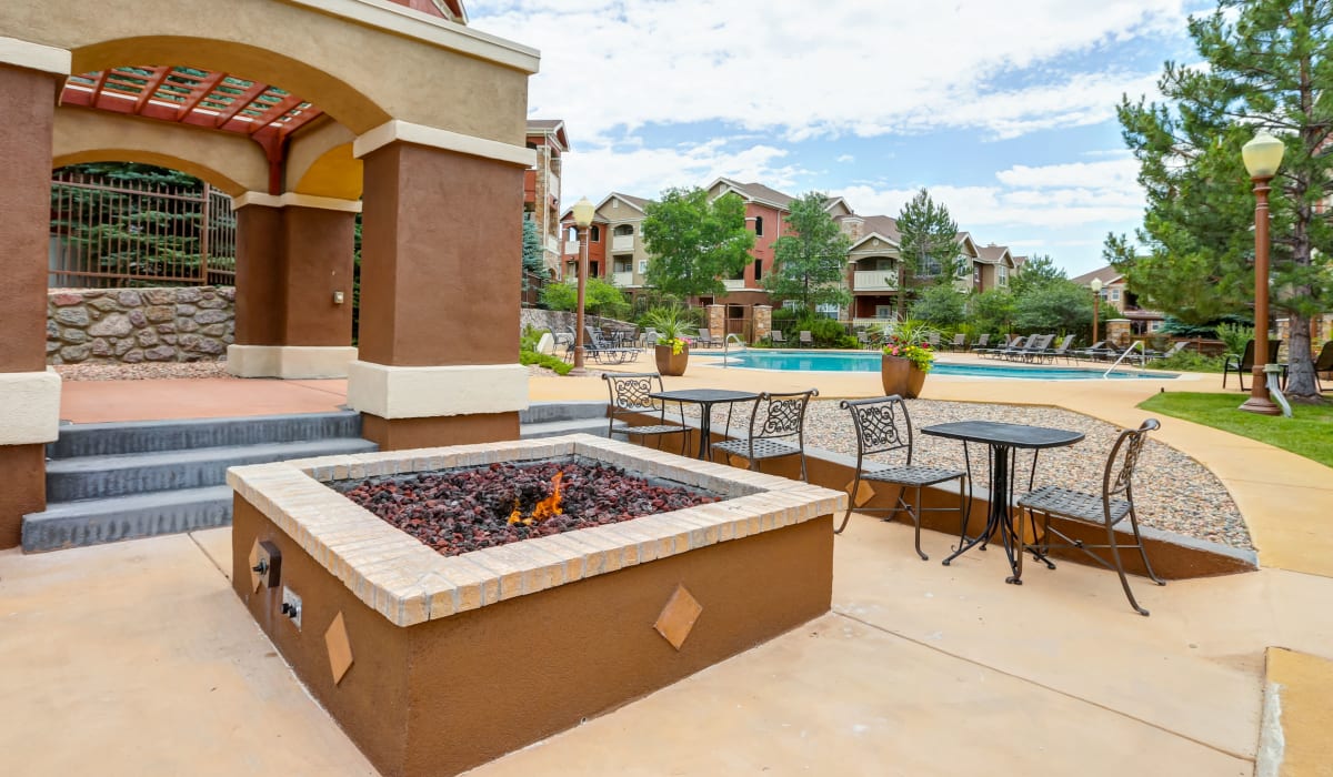 Outdoor firepit to heat up at on a cool night at Bella Springs Apartments in Colorado Springs, Colorado