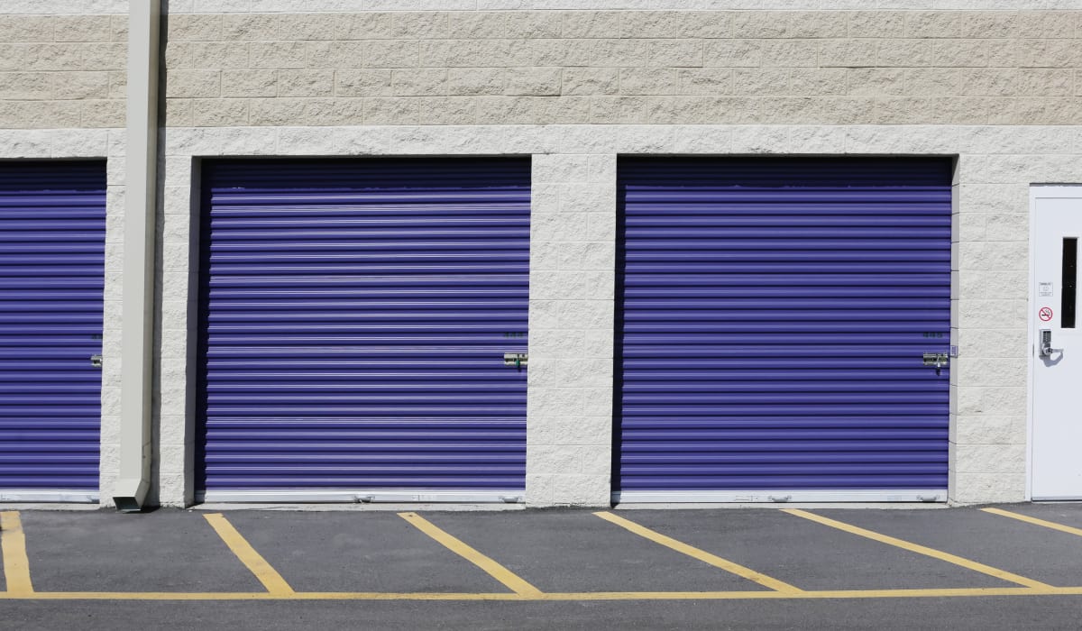 Units with blue doors at StoreSmart Self-Storage in Durham, North Carolina