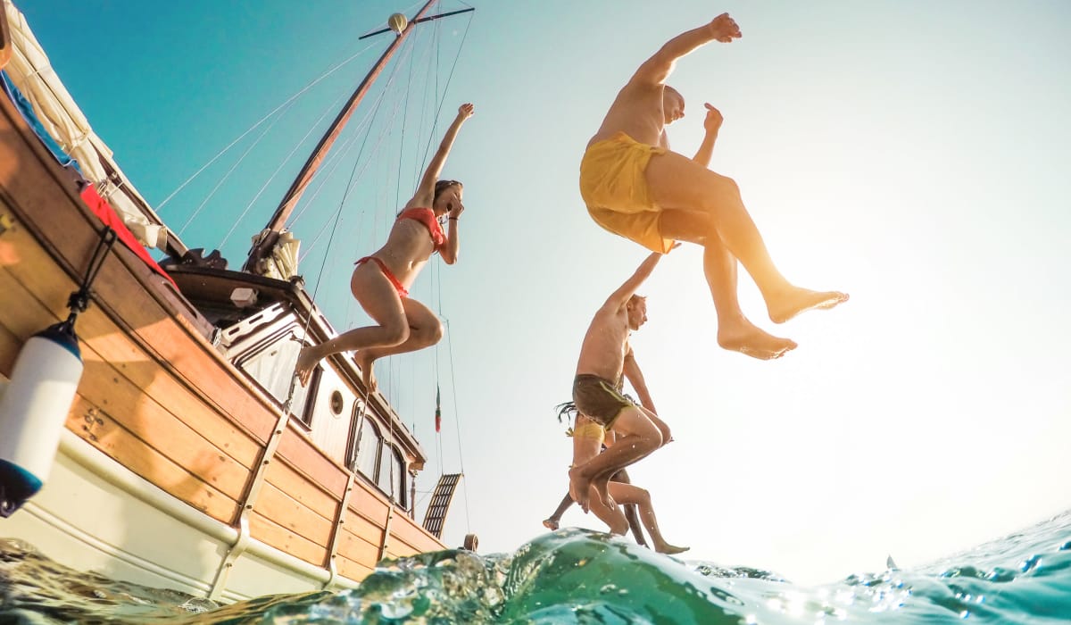 Residents jumping into the ocean near The Wayland in St Petersburg, Florida