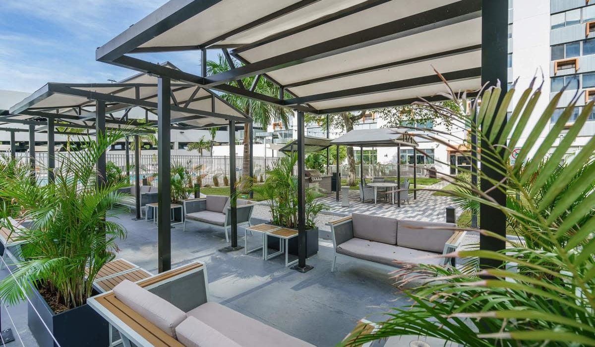Plenty of shaded seating near the barbecue area at Our Property in St Petersburg, Florida