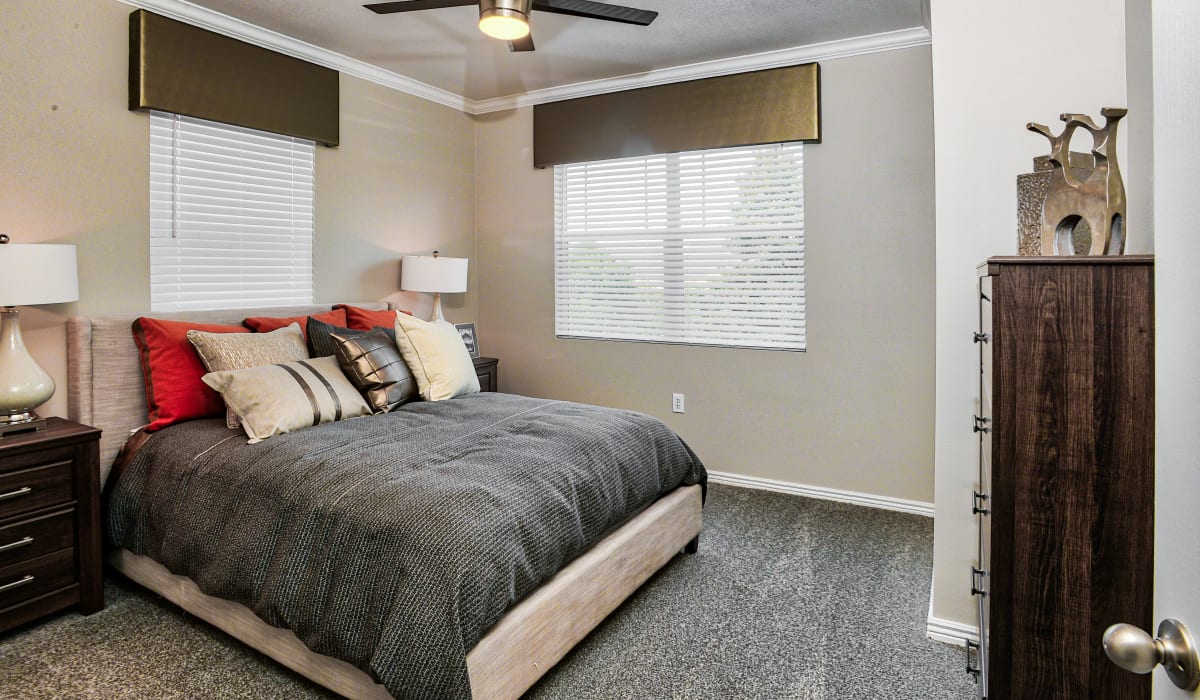 Ceiling fan in the carpeted bedroom at Bella Springs Apartments in Colorado Springs, Colorado