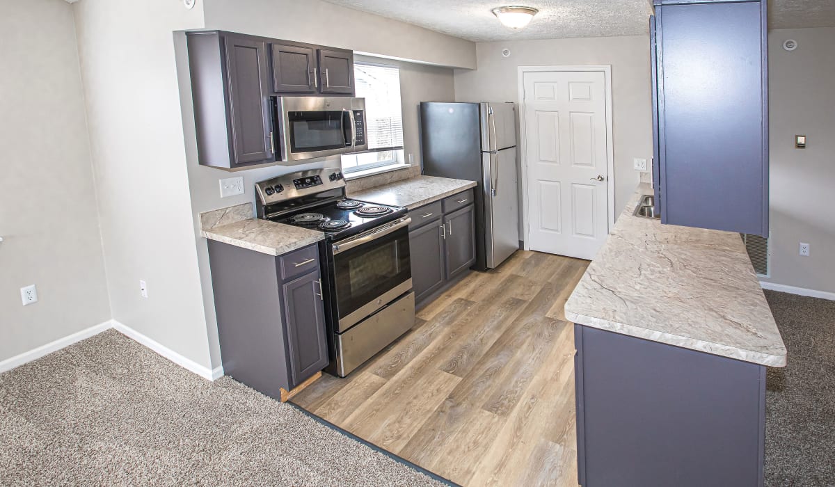 A kitchen with stainless-steel appliances at Silver Lake Hills in Fenton, Michigan