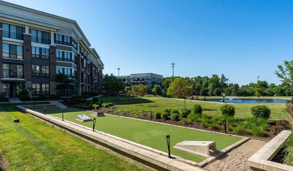 Cornhole court with view of the lake at Latitude at Deerfield Crossing in Mason, Ohio