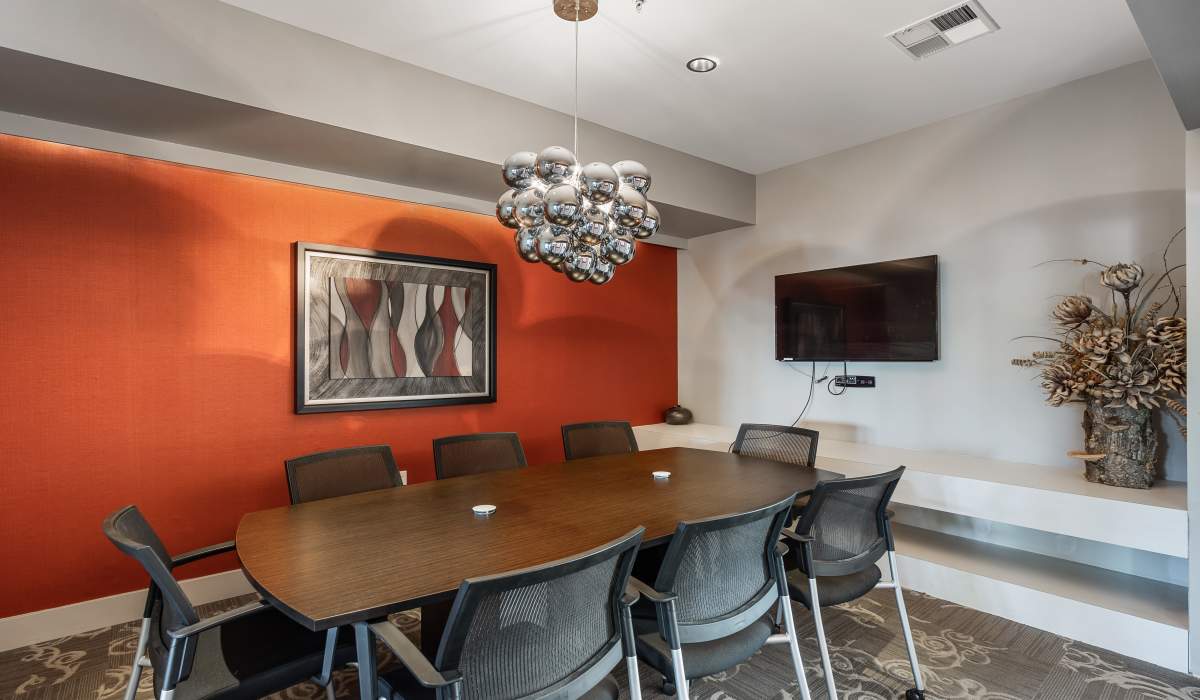 Clubhouse with multiple seating options at Latitude at Deerfield Crossing in Mason, Ohio