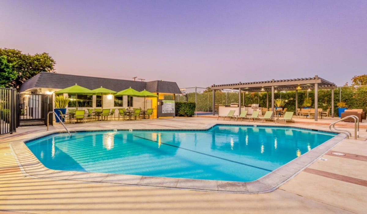 Outdoor pool and lounge at The Arbors at Magnolia in Anaheim, California