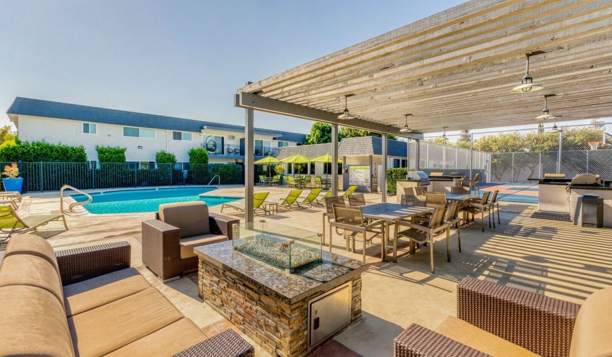 Outdoor pool and lounge at The Arbors at Magnolia in Anaheim, California