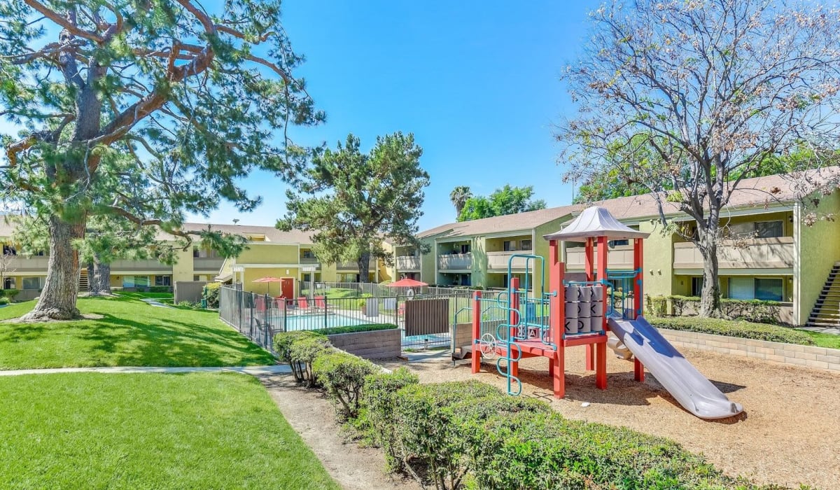 Playground amenities at Torrey Pines Apartment Homes in West Covina, California