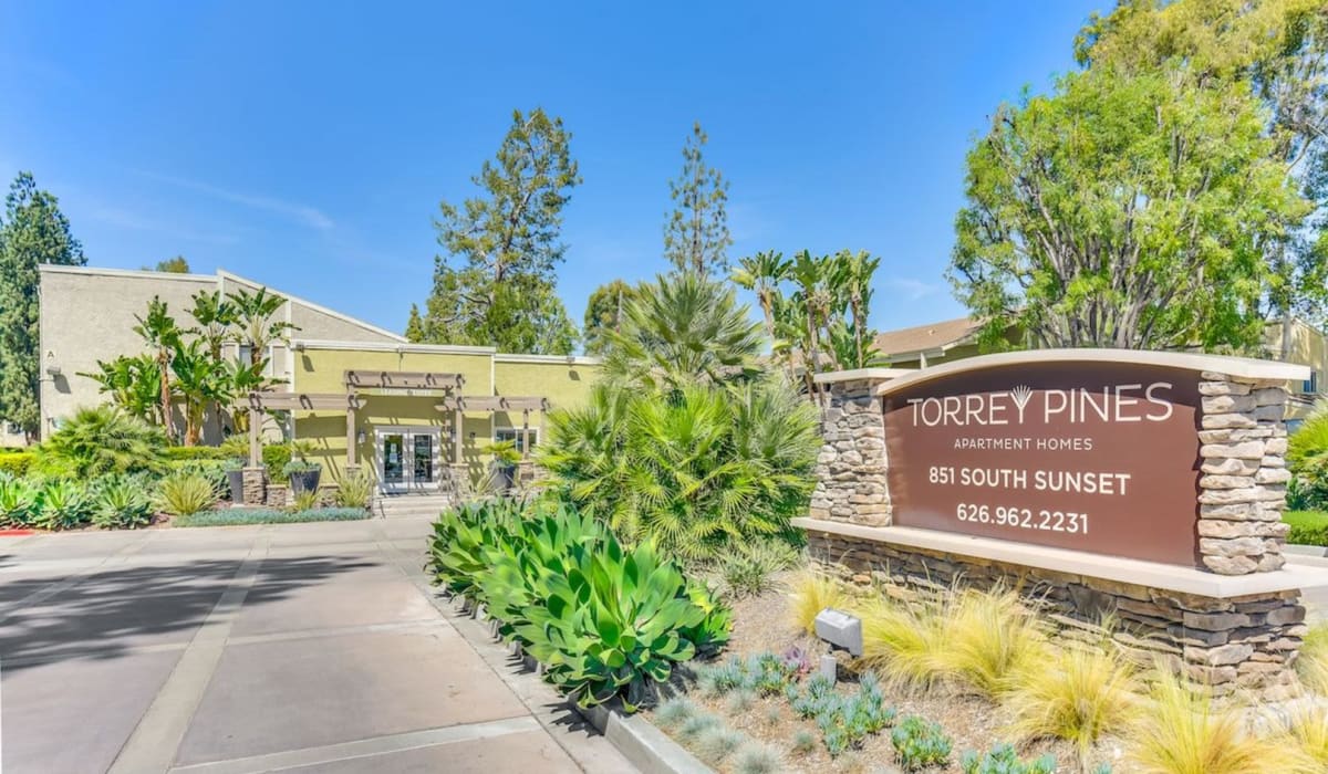 Welcome sign at Torrey Pines Apartment Homes in West Covina, California