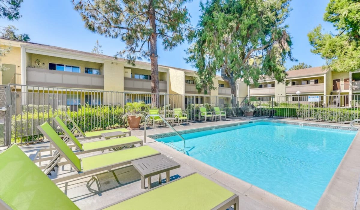 Swimming pool amenities at Torrey Pines Apartment Homes in West Covina, California