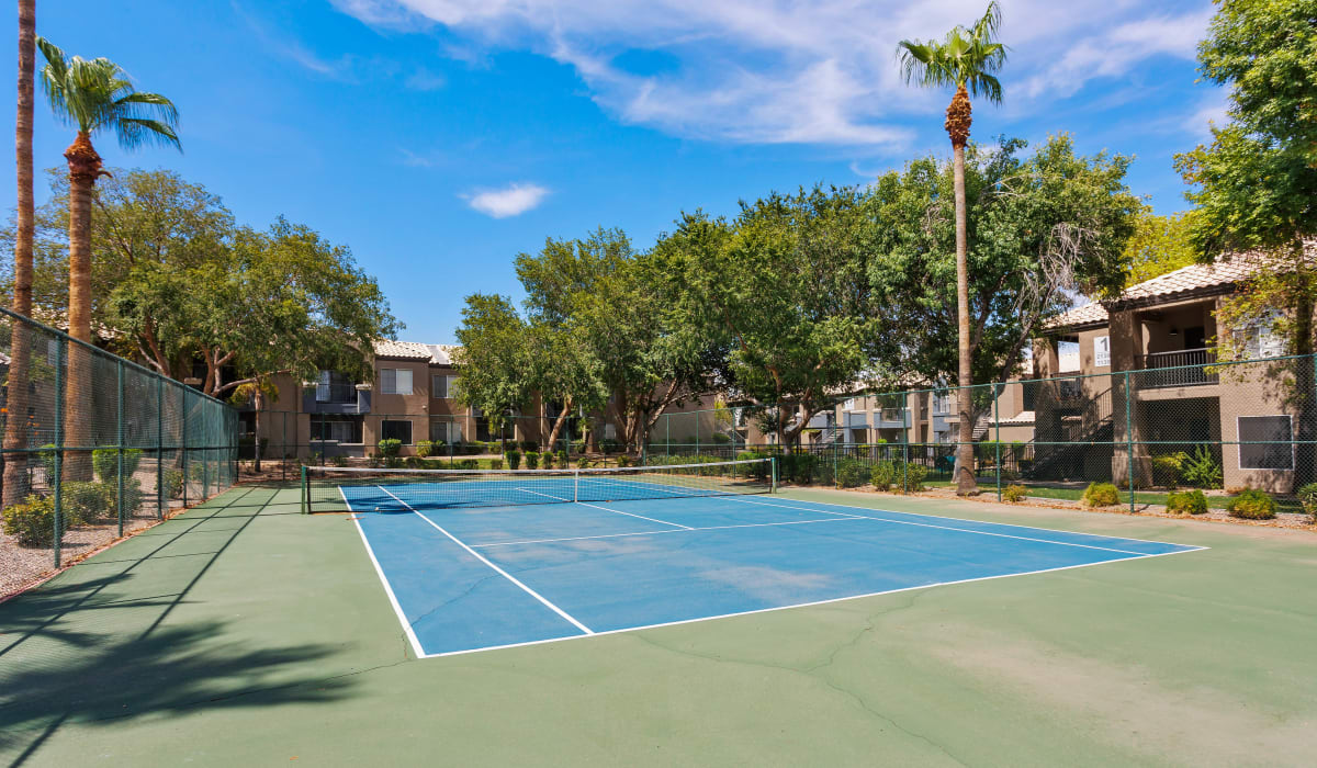 Sunny tennis court at Crestone at Shadow Mountain in Phoenix, Arizona