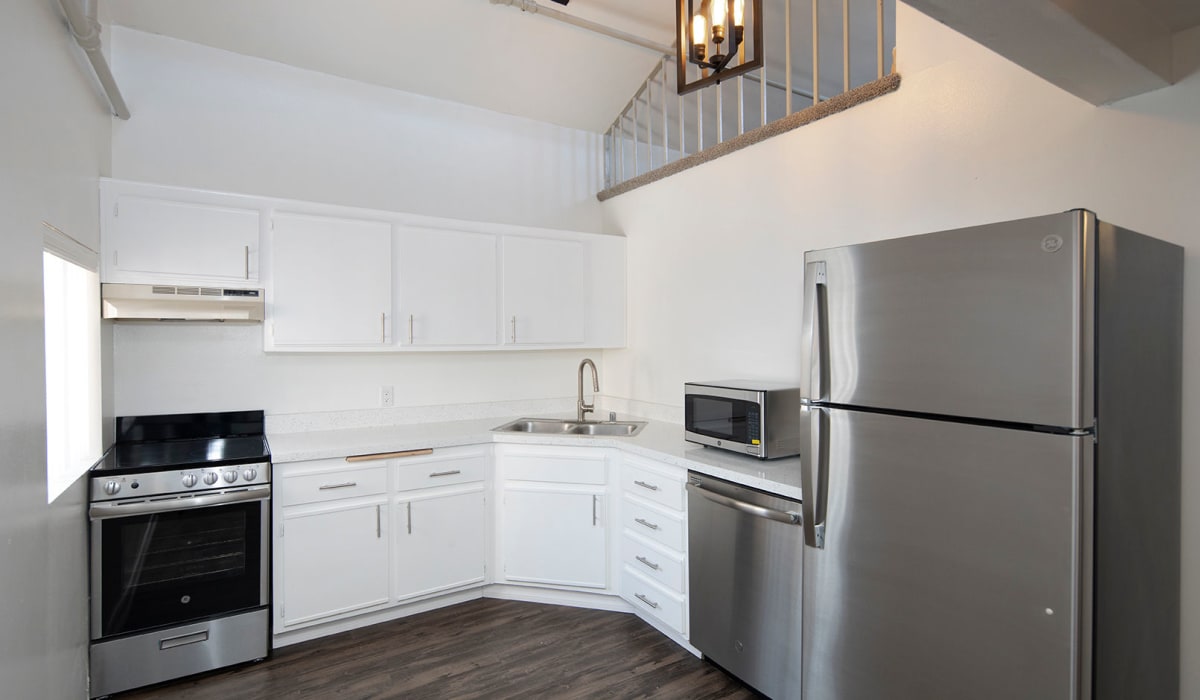 Photo of an apartment kitchen at Cornerstone Lofts. 