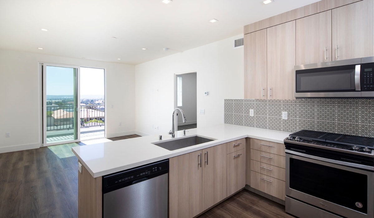 Apartment with wood-style flooring at Mission West Lofts in San Diego, California
