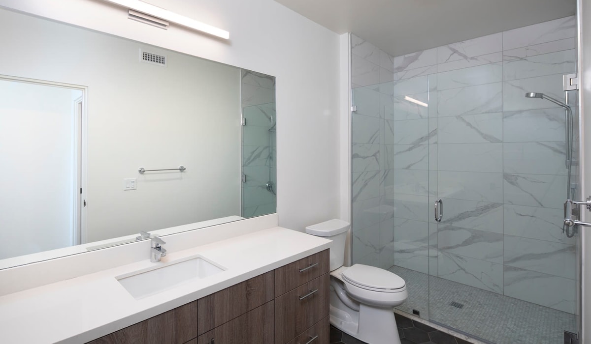 Bathroom with updated finishes at Mission West Lofts in San Diego, California