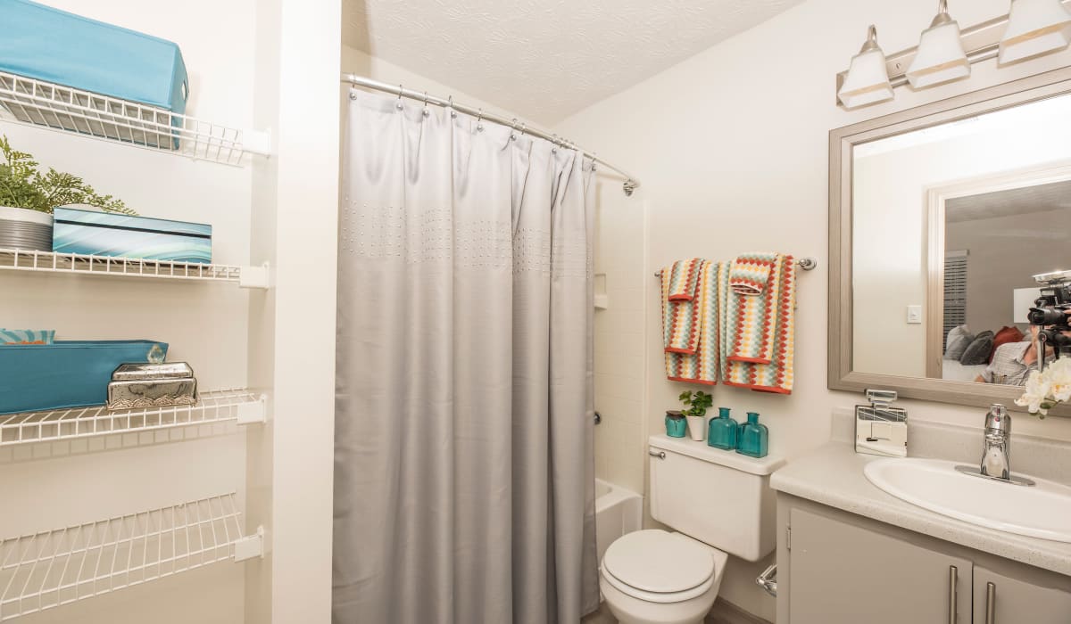 Bathroom with shelves at Reserve at Garden Lake in Riverdale, Georgia