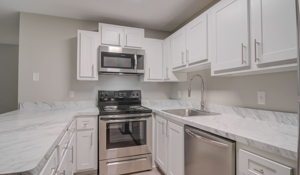 Kitchen at Reserve at Garden Lake in Riverdale, Georgia