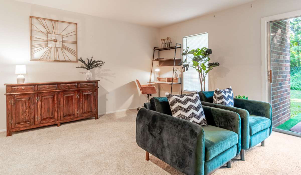 Living room with chairs at Willow Oaks Apartments in Richmond, Virginia