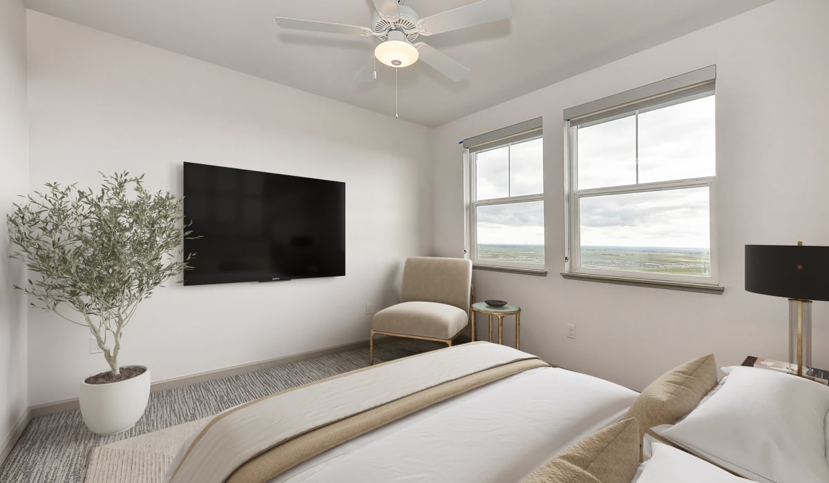 Bedroom with ceiling fan at The Pique in Folsom, California