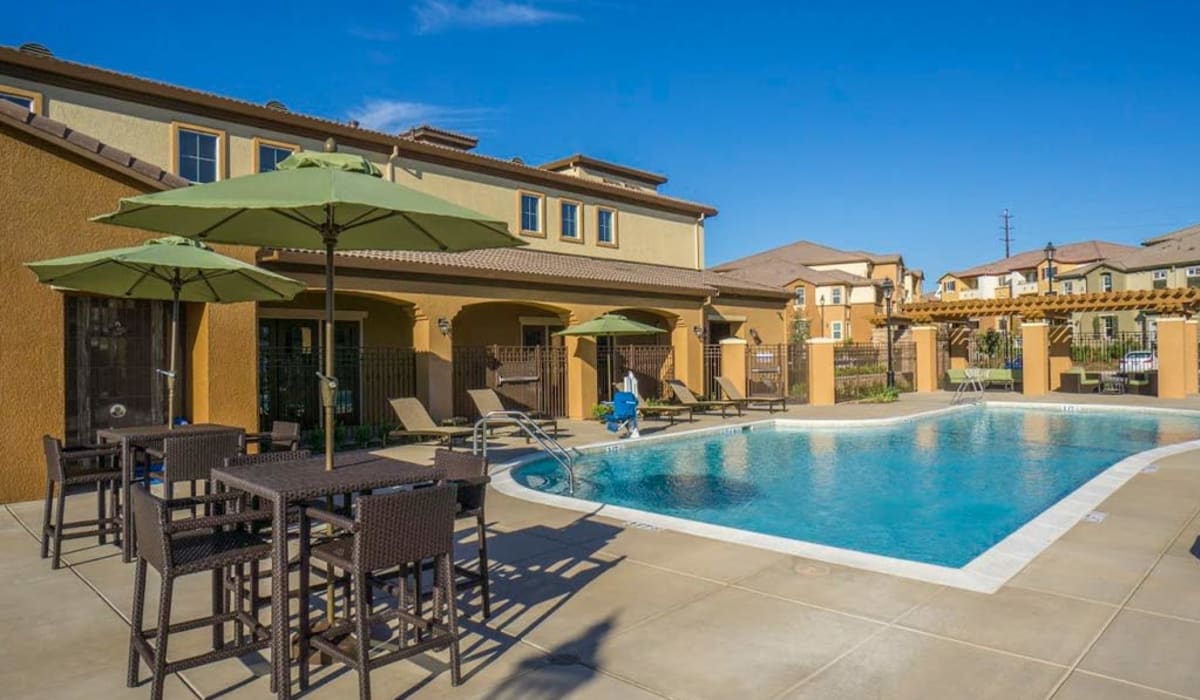 Swimming pool and tables at Pearl Creek in Roseville, California