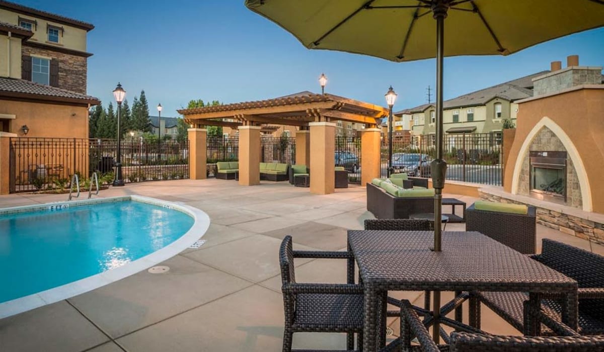 Picnic table by the pool at Pearl Creek in Roseville, California