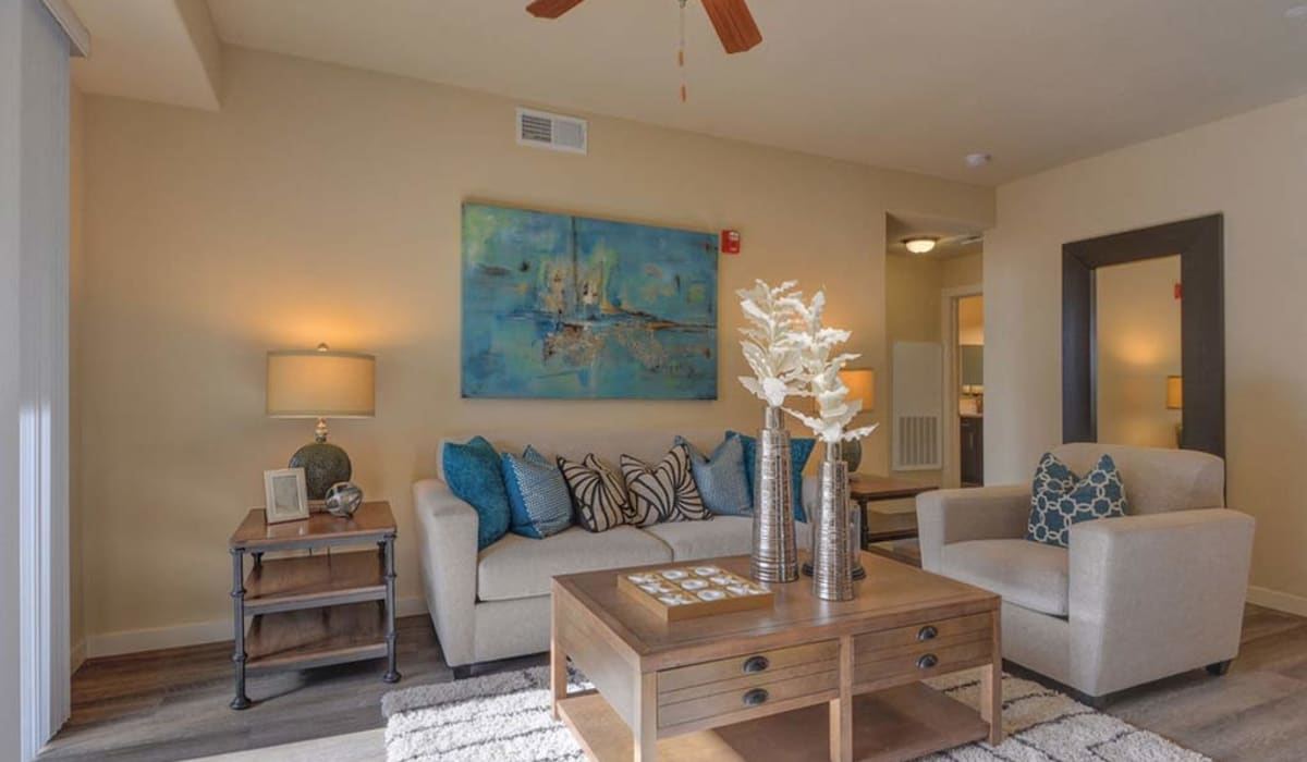 Living room with ceiling fan at Pearl Creek in Roseville, California