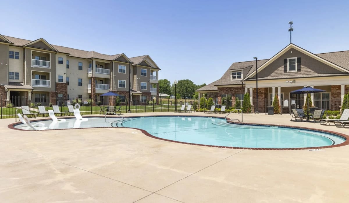 Relax by our outdoor swimming pool at The Maddox in Centerton, Arkansas